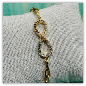 Pulsera Infinito de acero dorado y circonitas